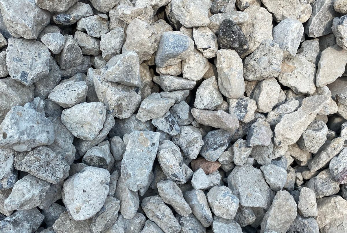 Crushed recycled concrete, pale grey angular chunks with the odd darker piece